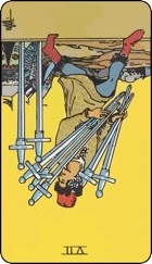 Seven of swords tarot card reversed