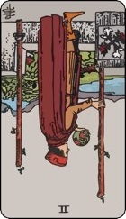 Two of wands tarot card reversed